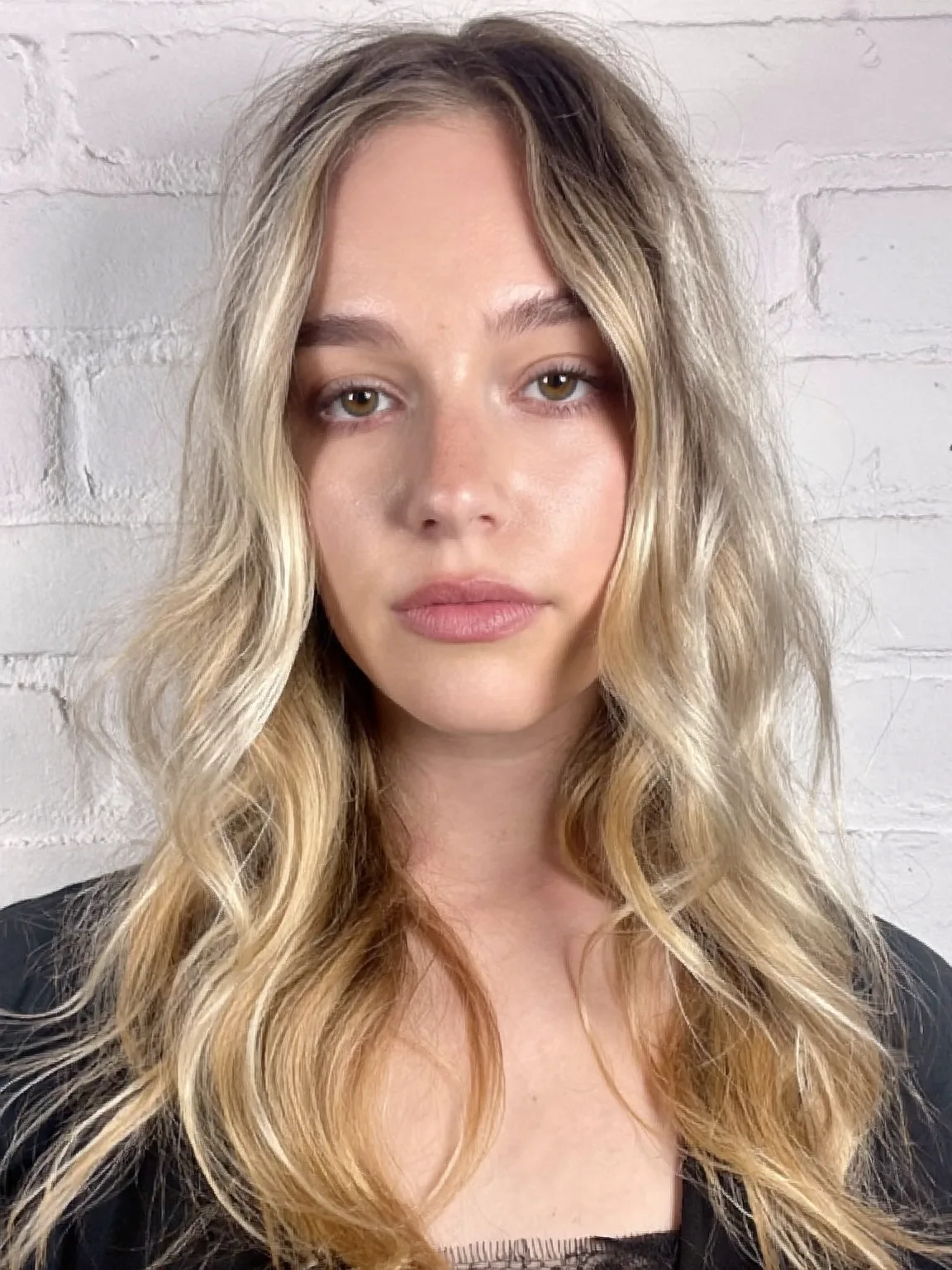 Blow-Dried Medium Volume Ash Blonde Layers with Subtle Highlights